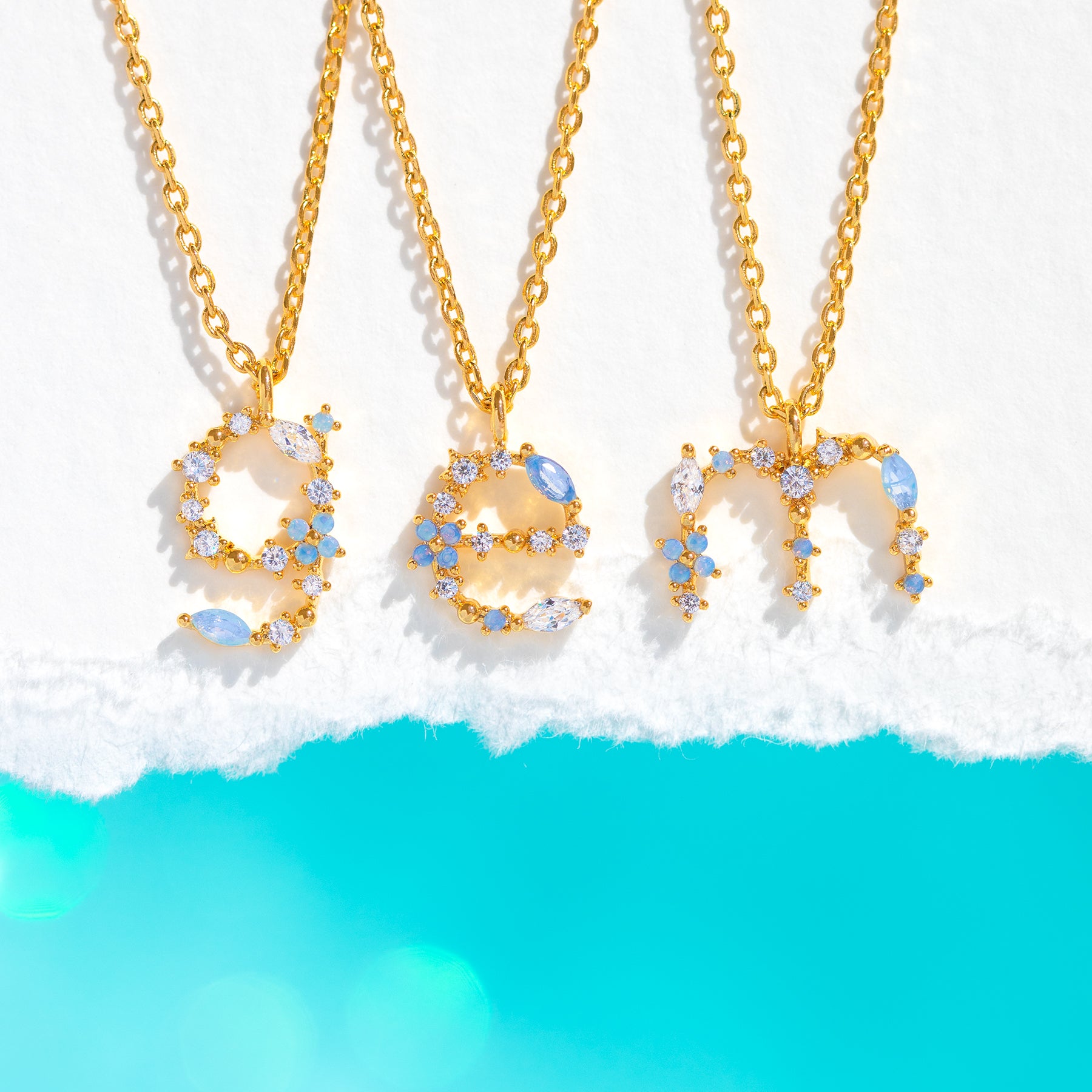 18ct gold initial necklace set with coloured cubic zirconia | Laval Europe